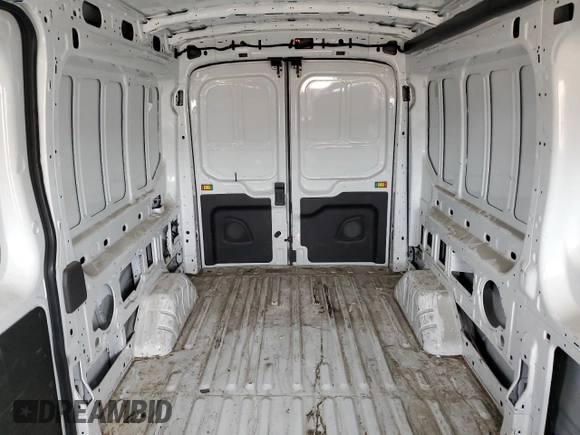 2023 Ford Transit Cargo with VIN 1FTBR1C84PKA17131, listed as a Copart auction lot 54901755 with 85,188 mi miles and Salvage title. Bid and sale history available at DreamBid. Image 10.