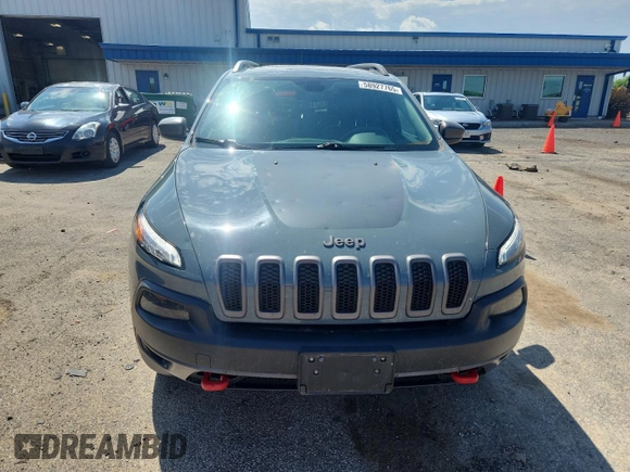 2015 Jeep Cherokee Trailhawk with VIN 1C4PJMBS4FW687328, listed as a Copart auction lot 58927765 with 119,483 mi miles and Non repairable. Bid and sale history available at DreamBid. Image 5.