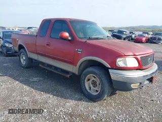 2001 Ford F-150 XL with VIN 1FTRX18L41KF38469, listed as a IAAI auction lot 41954075 with 219,967 mi miles. Bid and sale history available at carsss.com. Image 1.