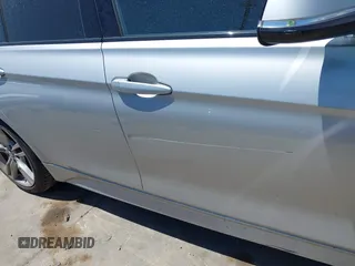 2014 BMW 3 Series 328i with VIN WBA3A5G5XENP31051, listed as a IAAI auction lot 42247591 with 152,073 mi miles and . Bid and sale history available at DreamBid. Image 6.
