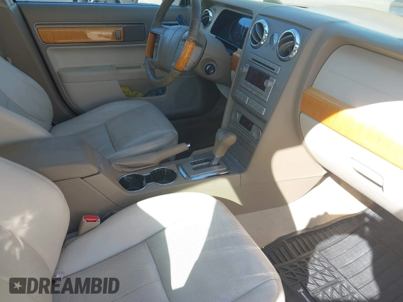 2009 Lincoln MKZ with VIN 3LNHM26T69R602589, listed as a IAAI auction lot 41589704 with 128,066 mi miles and . Bid and sale history available at DreamBid. Image 5.