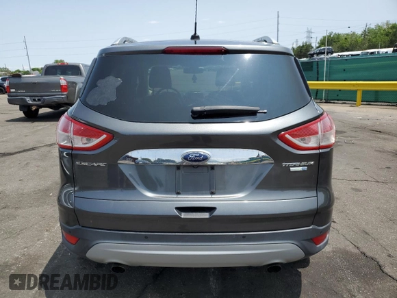 2015 Ford Escape Titanium with VIN 1FMCU9J98FUB49112, listed as a Copart auction lot 58989915 with 94,060 mi miles and Salvage title. Bid and sale history available at DreamBid. Image 6.