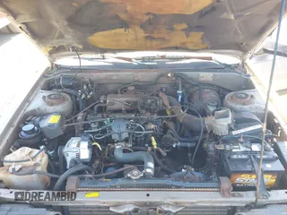 1986 Toyota Camry z VIN JT2SV16E1G0439200, wystawiony jako IAAI lot #42395141 z przebiegiem 159 698 mil mil oraz . Historia ofert i sprzedaży dostępna na DreamBid. Obrazek 10.