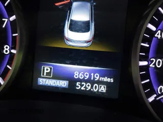 2015 Infiniti Q50 Premium z VIN JN1BV7AR9FM423471, wystawiony jako IAAI lot #42641857 z przebiegiem 86 919 mil mil oraz . Historia ofert i sprzedaży dostępna na DreamBid. Obrazek 15.