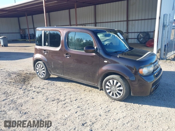 2011 Nissan Cube S z VIN JN8AZ2KR8BT202933, wystawiony jako IAAI lot #41701542 z przebiegiem 162 626 mil mil oraz . Historia ofert i sprzedaży dostępna na DreamBid. Obrazek 1.