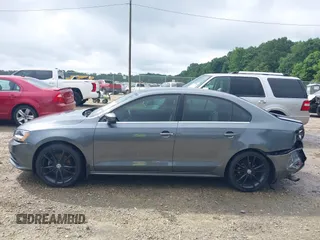 2017 Volkswagen Jetta S with VIN 3VW2B7AJ5HM368618, listed as a IAAI auction lot 42435559 with 112,781 mi miles and . Bid and sale history available at DreamBid. Image 14.