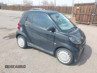 2009 Smart fortwo Pure with VIN WMEEJ31X59K312270, listed as a IAAI auction lot 41910686 with 111,107 mi miles. Bid and sale history available at carsss.com. Image 1.
