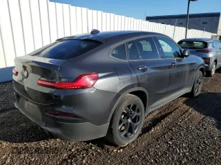 2020 BMW X4 xDrive30i z VIN 5UX2V1C02LLE67937, wystawiony jako Copart lot #70302802 z przebiegiem 30 553 mil mil oraz . Historia ofert i sprzedaży dostępna na DreamBid. Obrazek 3.