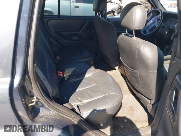 2001 Jeep Grand Cherokee Laredo with VIN 1J4GW48S31C550460, listed as a IAAI auction lot 42769410 with 261,640 mi miles and . Bid and sale history available at DreamBid. Image 8.