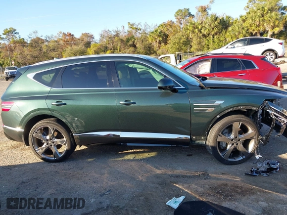 2021 Genesis GV80 with VIN KMUHCESC7MU072310, listed as a IAAI auction lot 41213884 with 18,480 mi miles and . Bid and sale history available at DreamBid. Image 13.