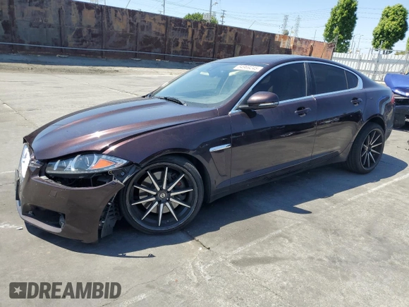 2015 Jaguar XF V6 Portfolio with VIN SAJWA0F79F8U60216, listed as a Copart auction lot 54969245 with 88,954 mi miles and Salvage Title. Bid and sale history available at carsss.com. Image 1.