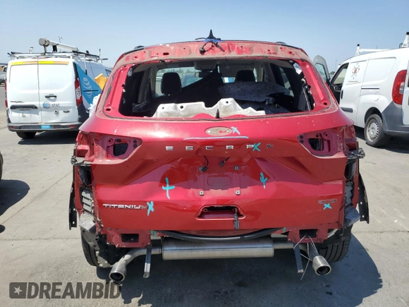 2020 Ford Escape Titanium with VIN 1FMCU9J98LUA58109, listed as a Copart auction lot 59397735 with 31,334 mi miles and Salvage title. Bid and sale history available at DreamBid. Image 6.