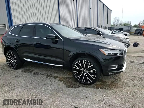2019 Volvo XC60 Inscription with VIN LYVA22RL0KB183901, listed as a Copart auction lot 53528455 with 93,754 mi miles and Salvage title. Bid and sale history available at DreamBid. Image 14.