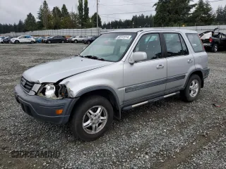 1999 Honda CR-V EX with VIN JHLRD1866XC074271, listed as a Copart auction lot 68741914 with 296,297 mi miles and Salvage Title. Bid and sale history available at carsss.com. Image 1.