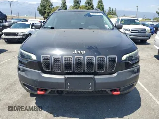 2021 Jeep Cherokee Trailhawk with VIN 1C4PJMBX8MD167153, listed as a Copart auction lot 54929845 with 52,800 mi miles and Clean title. Bid and sale history available at DreamBid. Image 5.