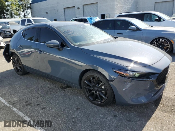2022 Mazda 3 Premium with VIN JM1BPAML8N1511424, listed as a Copart auction lot 57108135 with 52,791 mi miles and Salvage title. Bid and sale history available at DreamBid. Image 4.