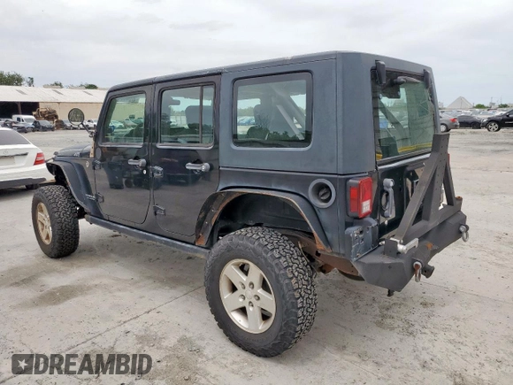 2008 Jeep Wrangler Unlimited Rubicon z VIN 1J4GA69128L529271, wystawiony jako Copart lot #58939945 z przebiegiem 94 503 mil mil oraz Szkoda całkowita • Salvage title. Historia ofert i sprzedaży dostępna na DreamBid. Obrazek 2.