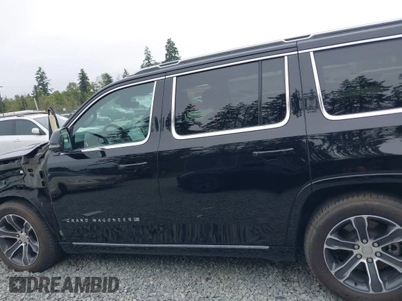 2023 Jeep Grand Wagoneer with VIN 1C4SJVEJ2PS573498, listed as a IAAI auction lot 42684957 with 7,334 mi miles and . Bid and sale history available at DreamBid. Image 15.