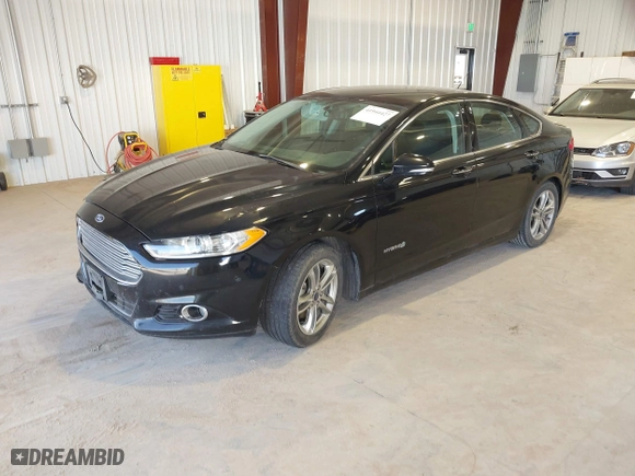 2016 Ford Fusion Titanium Hybrid with VIN 3FA6P0RU7GR127307, listed as a IAAI auction lot 41944427 with 128,076 mi miles. Bid and sale history available at carsss.com. Image 18.