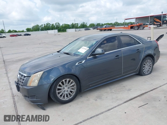 2012 Cadillac CTS with VIN 1G6DA5E58C0152938, listed as a IAAI auction lot 42319555 with 190,259 mi miles and . Bid and sale history available at DreamBid. Image 2.