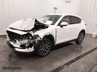 2017 Mazda CX-5 Grand Touring with VIN JM3KFBDL1H0203358, listed as a IAAI auction lot 41526776 with 63,167 mi miles. Bid and sale history available at carsss.com. Image 17.