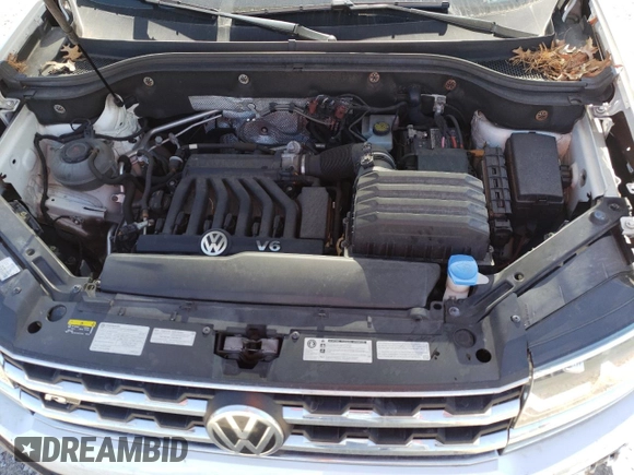 2019 Volkswagen Atlas SE z VIN 1V2XR2CA0KC502656, wystawiony jako Copart lot #50589045 z przebiegiem 131 954 mil mil oraz Szkoda całkowita • Salvage title. Historia ofert i sprzedaży dostępna na DreamBid. Obrazek 13.
