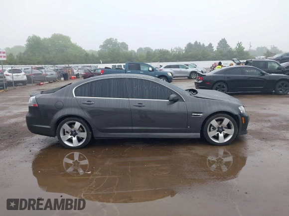 2009 Pontiac G8 GT z VIN 6G2EC57Y19L203150, wystawiony jako IAAI lot #42314747 z przebiegiem 130 188 mil mil oraz . Historia ofert i sprzedaży dostępna na DreamBid. Obrazek 13.