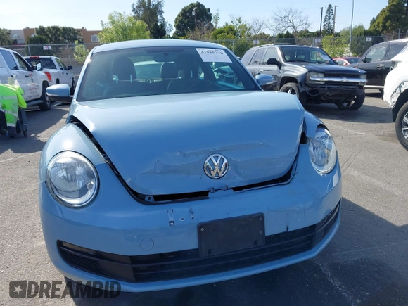 2013 Volkswagen Beetle with VIN 3VWHX7AT4DM667136, listed as a IAAI auction lot 41855778 with 120,300 mi miles and . Bid and sale history available at DreamBid. Image 13.