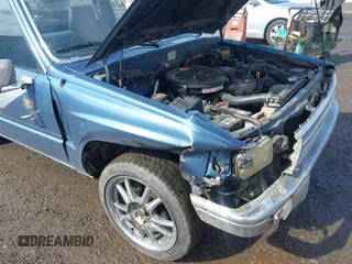 1988 Toyota Pickup with VIN JT4RN50R5J5169942, listed as a IAAI auction lot 42152517 with 218,579 mi miles and . Bid and sale history available at DreamBid. Image 6.