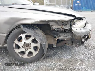 1998 Toyota Camry LE z VIN 4T1BF28K0WU066098, wystawiony jako IAAI lot #41971003 z przebiegiem 324 180 mil mil oraz . Historia ofert i sprzedaży dostępna na DreamBid. Obrazek 6.