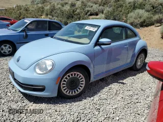 2015 Volkswagen Beetle 1.8T with VIN 3VWJ17AT1FM617221, listed as a Copart auction lot 62307745 with 135,671 mi miles and Clean title. Bid and sale history available at DreamBid. Image 1.