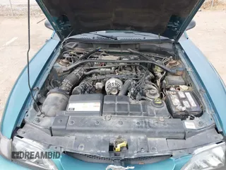 1996 Ford Mustang GT with VIN 1FALP45X7TF129303, listed as a IAAI auction lot 41698238 with 130,181 mi miles. Bid and sale history available at carsss.com. Image 10.