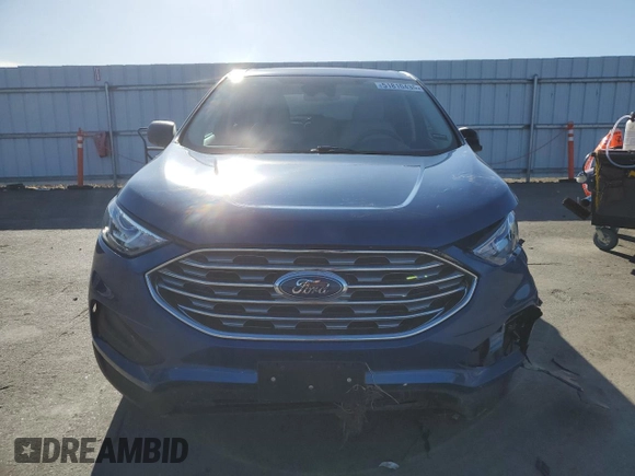 2021 Ford Edge SE z VIN 2FMPK4G98MBA23448, wystawiony jako Copart lot #51810435 z przebiegiem Nie podano mil oraz Szkoda całkowita • Salvage title. Historia ofert i sprzedaży dostępna na DreamBid. Obrazek 5.