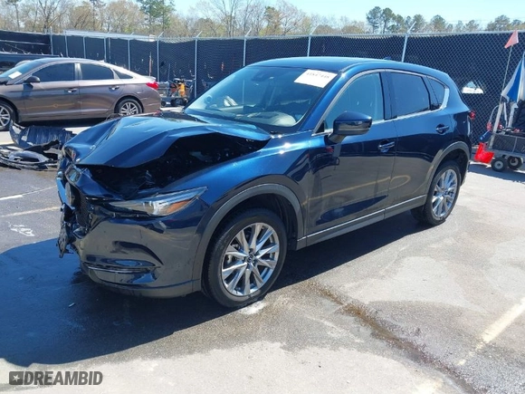 2021 Mazda CX-5 Grand Touring with VIN JM3KFBDM8M1426932, listed as a IAAI auction lot 41847448 with 17,933 mi miles. Bid and sale history available at carsss.com. Image 2.