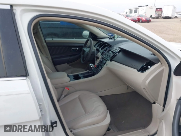2011 Ford Taurus SE with VIN 1FAHP2DW5BG142756, listed as a IAAI auction lot 41680444 with 198,206 mi miles and . Bid and sale history available at DreamBid. Image 5.