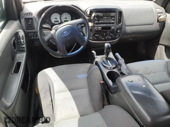 2005 Ford Escape XLS Value with VIN 1FMYU92Z95DA22100, listed as a Copart auction lot 57874705 with 192,057 mi miles and Salvage title. Bid and sale history available at DreamBid. Image 8.