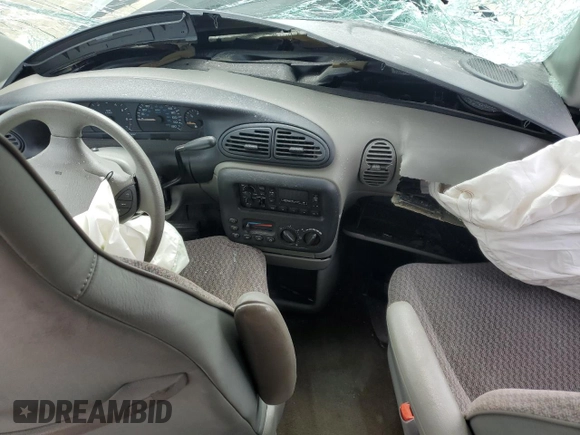 1999 Dodge Caravan with VIN 1B4GP45G7XB529075, listed as a Copart auction lot 60448215 with Not provided miles and Salvage title. Bid and sale history available at DreamBid. Image 8.
