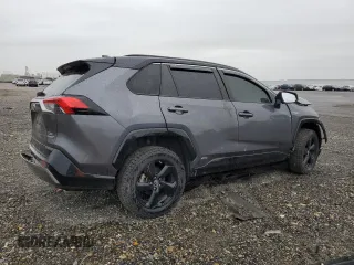 2019 Toyota RAV4 Hybrid XSE with VIN JTMEWRFV3KD517901, listed as a Copart auction lot 57329545 with Not provided miles and Salvage title. Bid and sale history available at DreamBid. Image 3.