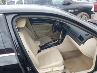 2014 Volkswagen Passat SE w/Sunroof with VIN 1VWBT7A36EC093451, listed as a IAAI auction lot 41682706 with 165,693 mi miles. Bid and sale history available at carsss.com. Image 5.