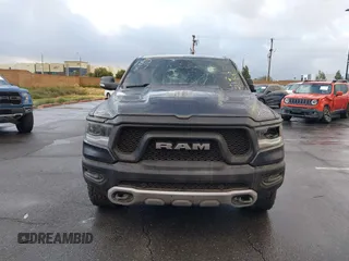 2019 Ram 1500 Rebel z VIN 1C6SRFLT2KN900600, wystawiony jako IAAI lot #41307832 z przebiegiem 74 481 mil mil oraz . Historia ofert i sprzedaży dostępna na DreamBid. Obrazek 12.