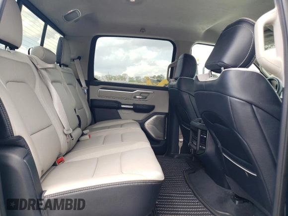 2023 Ram 1500 Limited with VIN 1C6SRFHT4PN502708, listed as a Copart auction lot 51549235 with 31,950 mi miles and Salvage title. Bid and sale history available at DreamBid. Image 10.