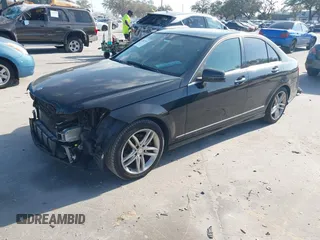 2014 Mercedes-Benz C-Class C 250 Sport with VIN WDDGF4HB3EG250671, listed as a IAAI auction lot 41607910 with 136,556 mi miles. Bid and sale history available at carsss.com. Image 22.