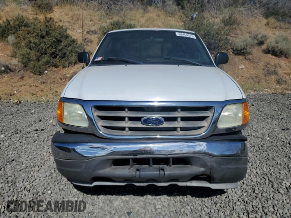 2004 Ford F-150 XL with VIN 2FTRF18W54CA36334, listed as a Copart auction lot 63464375 with 253,805 mi miles and Salvage title. Bid and sale history available at DreamBid. Image 5.