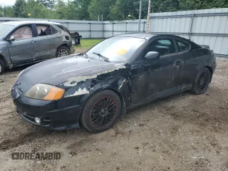 2003 Hyundai Tiburon GT z VIN KMHHN65F83U101784, wystawiony jako Copart lot #41566805 z przebiegiem 99 970 mil mil oraz Nie do naprawy • Non repairable. Historia ofert i sprzedaży dostępna na DreamBid. Obrazek 1.