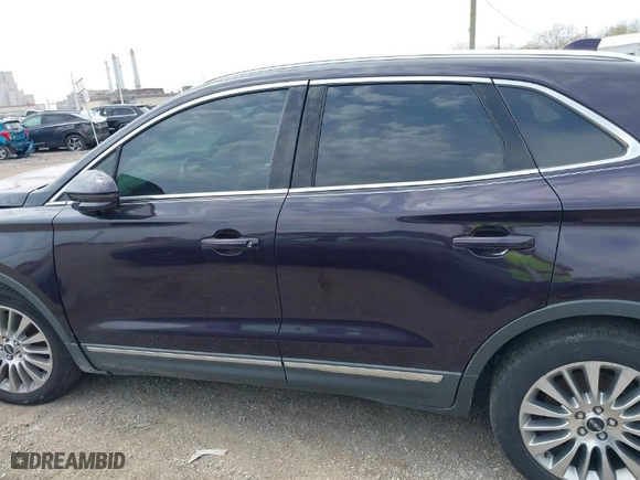 2015 Lincoln MKC with VIN 5LMTJ2AH5FUJ20686, listed as a IAAI auction lot 42037069 with 134,122 mi miles. Bid and sale history available at carsss.com. Image 14.