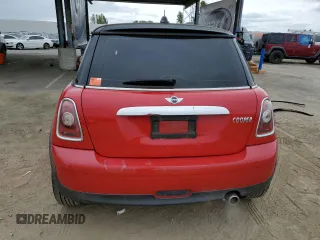 2009 MINI Hardtop with VIN WMWMF33519TW77558, listed as a Copart auction lot 54556785 with 97,749 mi miles and Salvage Title. Bid and sale history available at DreamBid. Image 6.