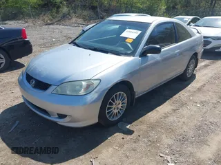 2005 Honda Civic Cpe LX with VIN 1HGEM22555L080708, listed as a IAAI auction lot 41884559 with 273,112 mi miles. Bid and sale history available at carsss.com. Image 2.