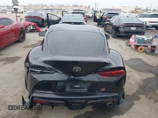 2021 Toyota Supra 2.0 with VIN WZ1DB2C07MW042723, listed as a IAAI auction lot 42635977 with 54,011 mi miles and . Bid and sale history available at DreamBid. Image 16.