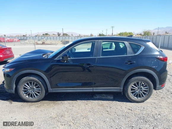 2017 Mazda CX-5 Sport with VIN JM3KFBBL2H0144792, listed as a IAAI auction lot 41654031 with 77,107 mi miles. Bid and sale history available at carsss.com. Image 14.