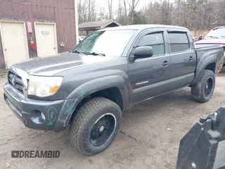 2009 Toyota Tacoma with VIN 3TMLU42N99M036667, listed as a IAAI auction lot 41856732 with 168,748 mi miles and . Bid and sale history available at DreamBid. Image 2.
